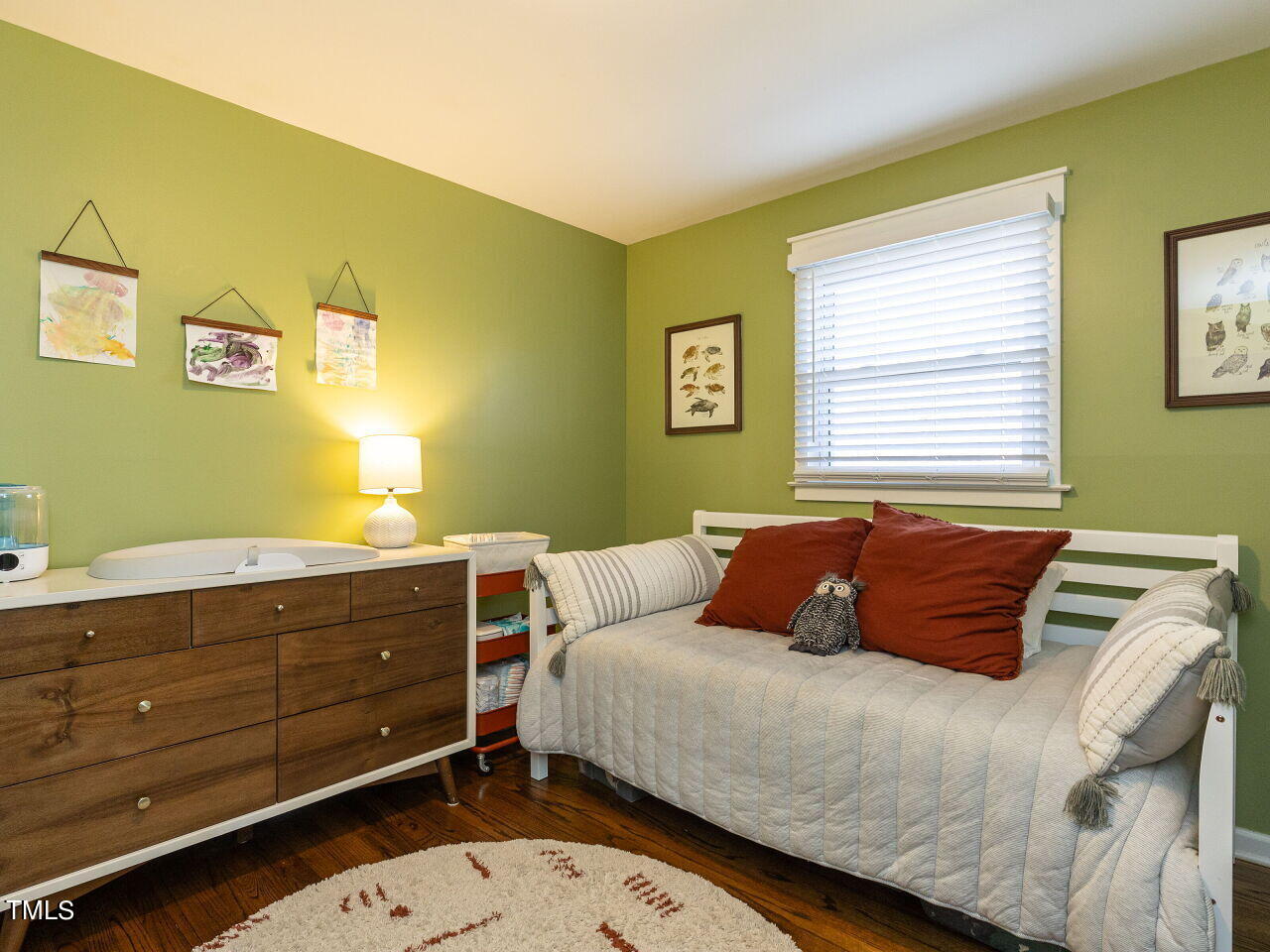 125 Crestview Drive Durham, NC 27712 - Photo 22 of 30 a bedroom with a bed and window