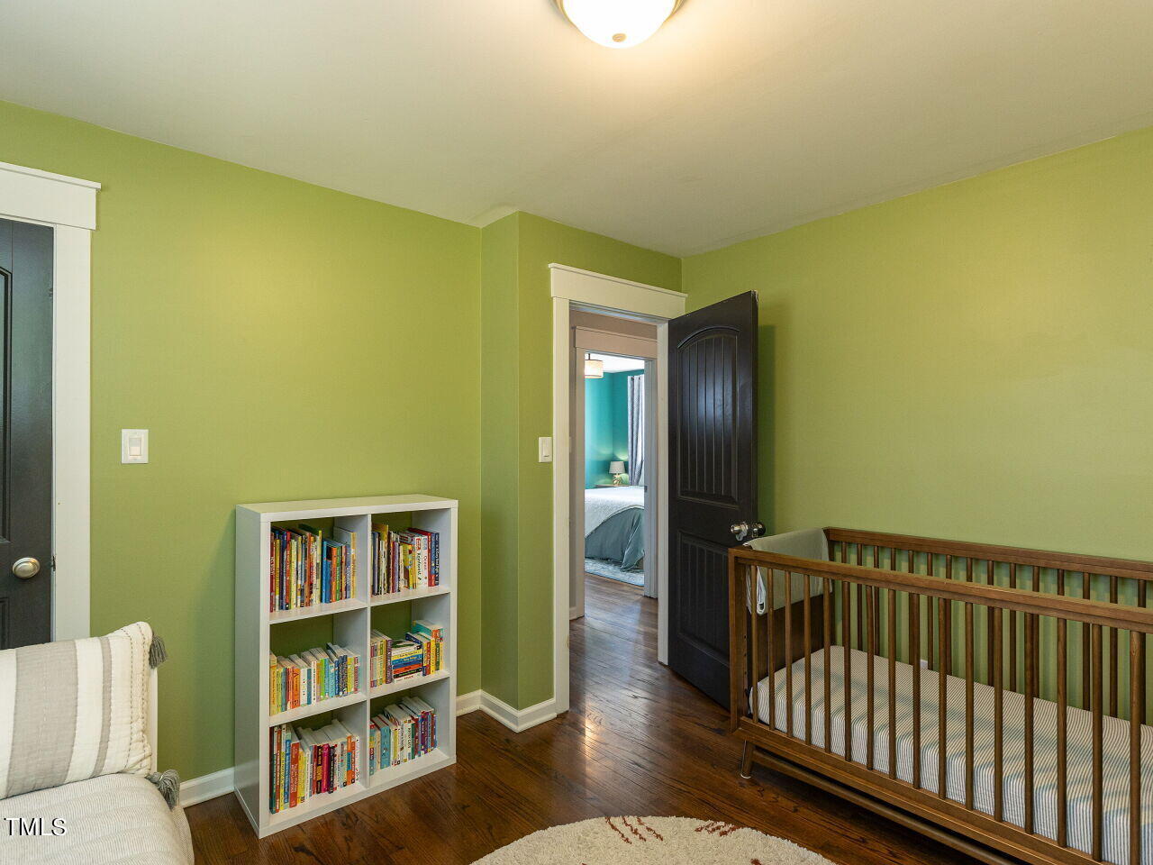 125 Crestview Drive Durham, NC 27712 - Photo 23 of 30 a living room with fish tank and a bookshelf