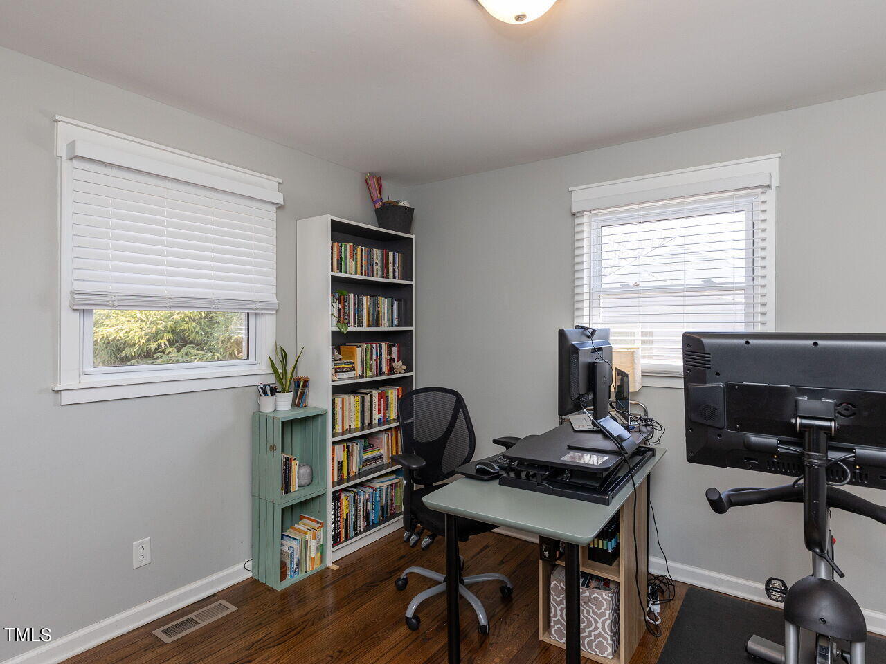 125 Crestview Drive Durham, NC 27712 - Photo 24 of 30 a view of a workspace with furniture and a window
