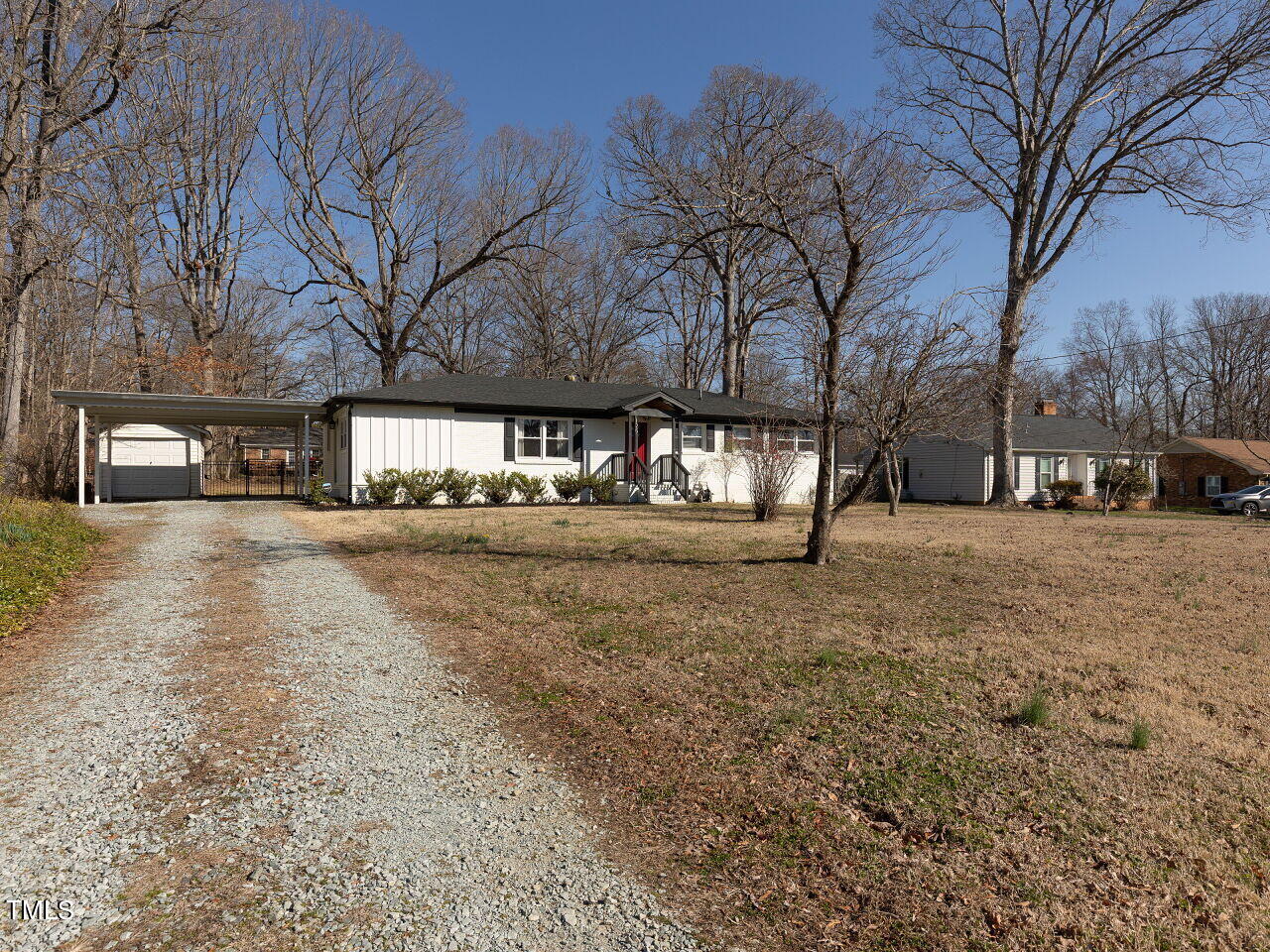 125 Crestview Drive Durham, NC 27712 - Photo 4 of 30 a street view with large trees