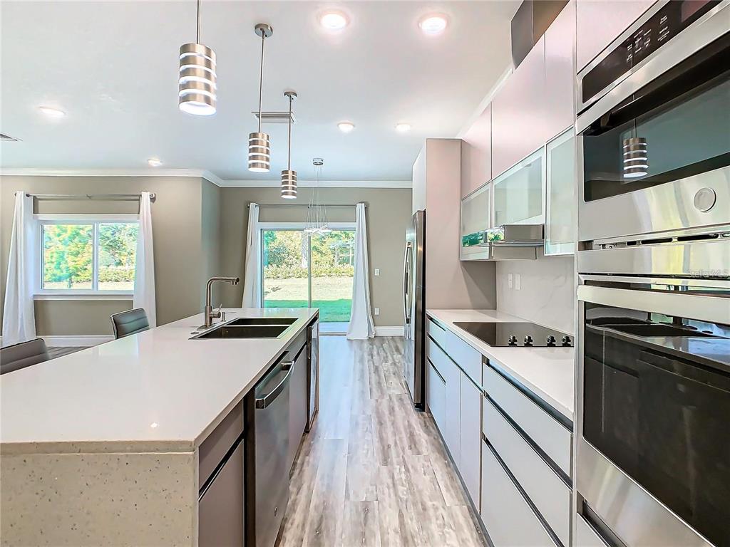 2000 Greenbriar Terrace Davenport, FL 33837 - Photo 11 of 50 a kitchen with a stove and a sink