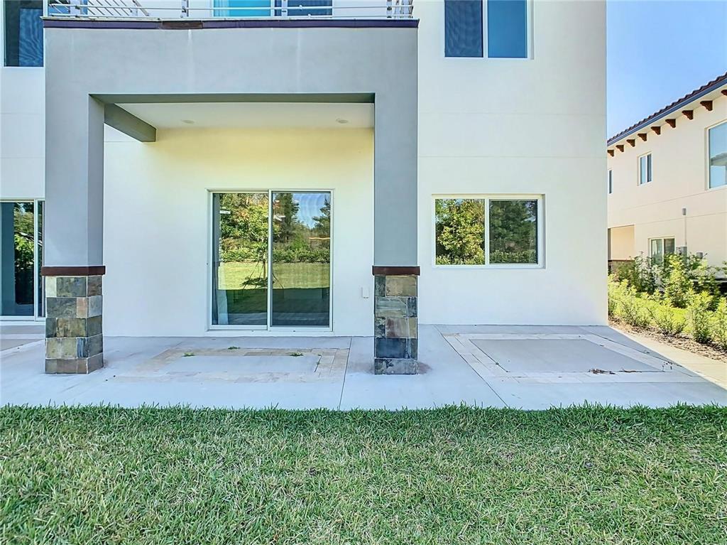 2000 Greenbriar Terrace Davenport, FL 33837 - Photo 22 of 50 a front view of a house with garden