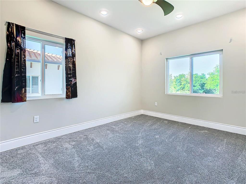 2000 Greenbriar Terrace Davenport, FL 33837 - Photo 34 of 50 an empty room with windows and closet