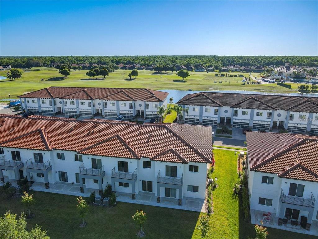 2000 Greenbriar Terrace Davenport, FL 33837 - Photo 46 of 50 an aerial view of residential houses with outdoor space and ocean view