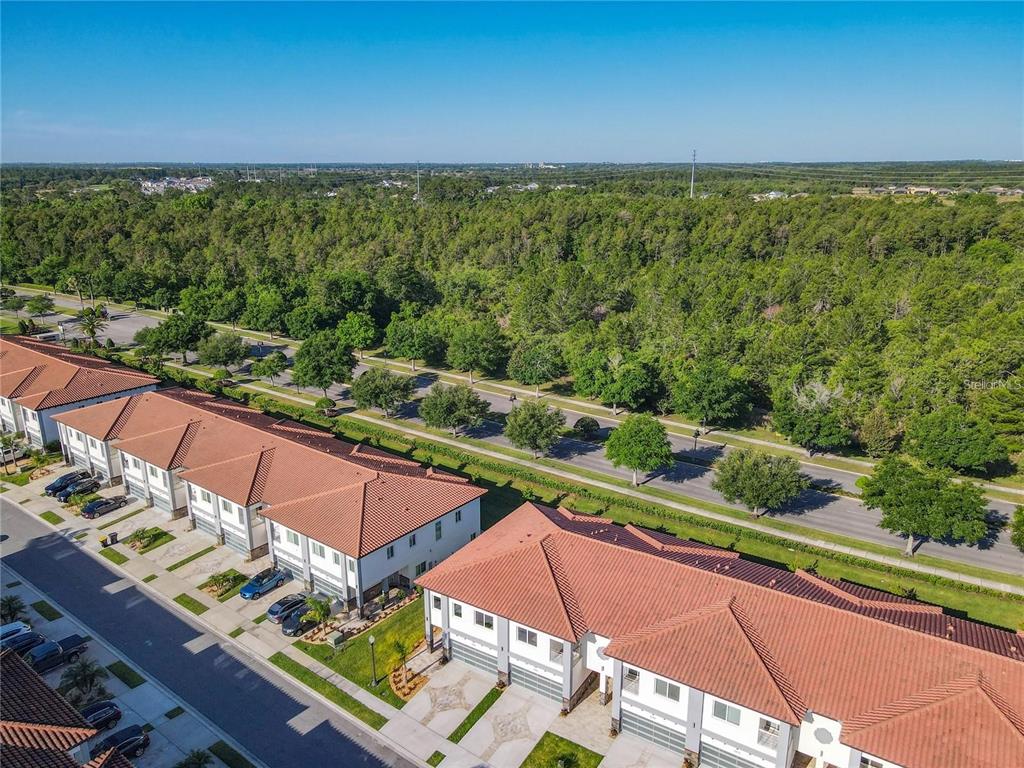 2000 Greenbriar Terrace Davenport, FL 33837 - Photo 7 of 50 a view of yard from deck with patio