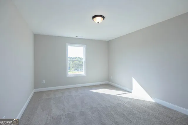 an empty room with an entryway
