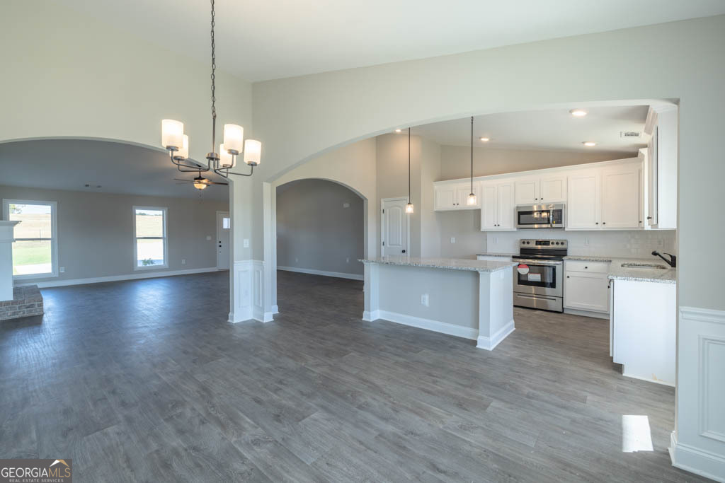 1247 Anderson Thomas Road, Unit 9 Martin, GA 30557 - Photo 8 of 30 a view of kitchen with sink and refrigerator