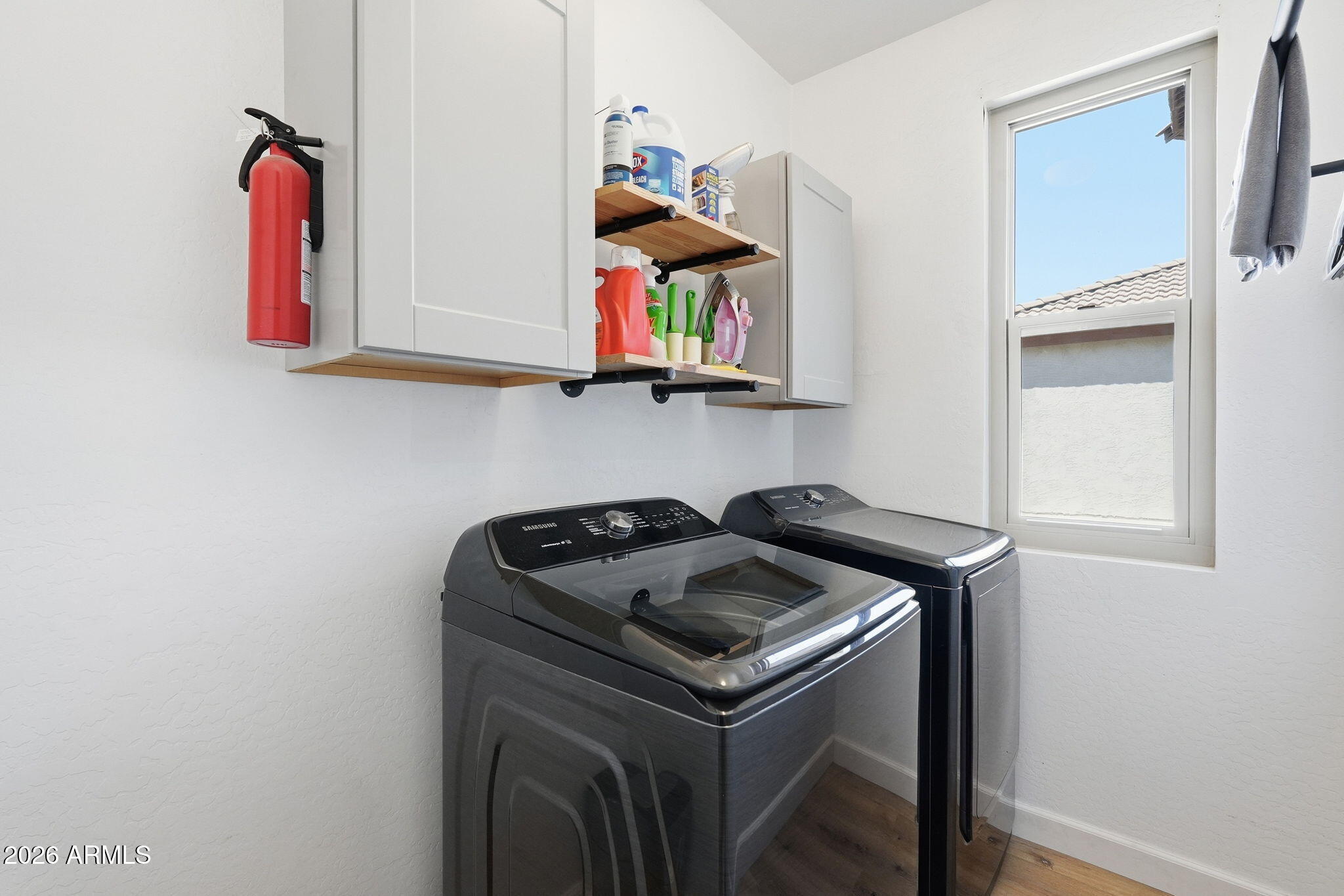 4184 East Trigger Way Gilbert, AZ 85297 - Photo 31 of 51 a utility room with sink dryer and washer