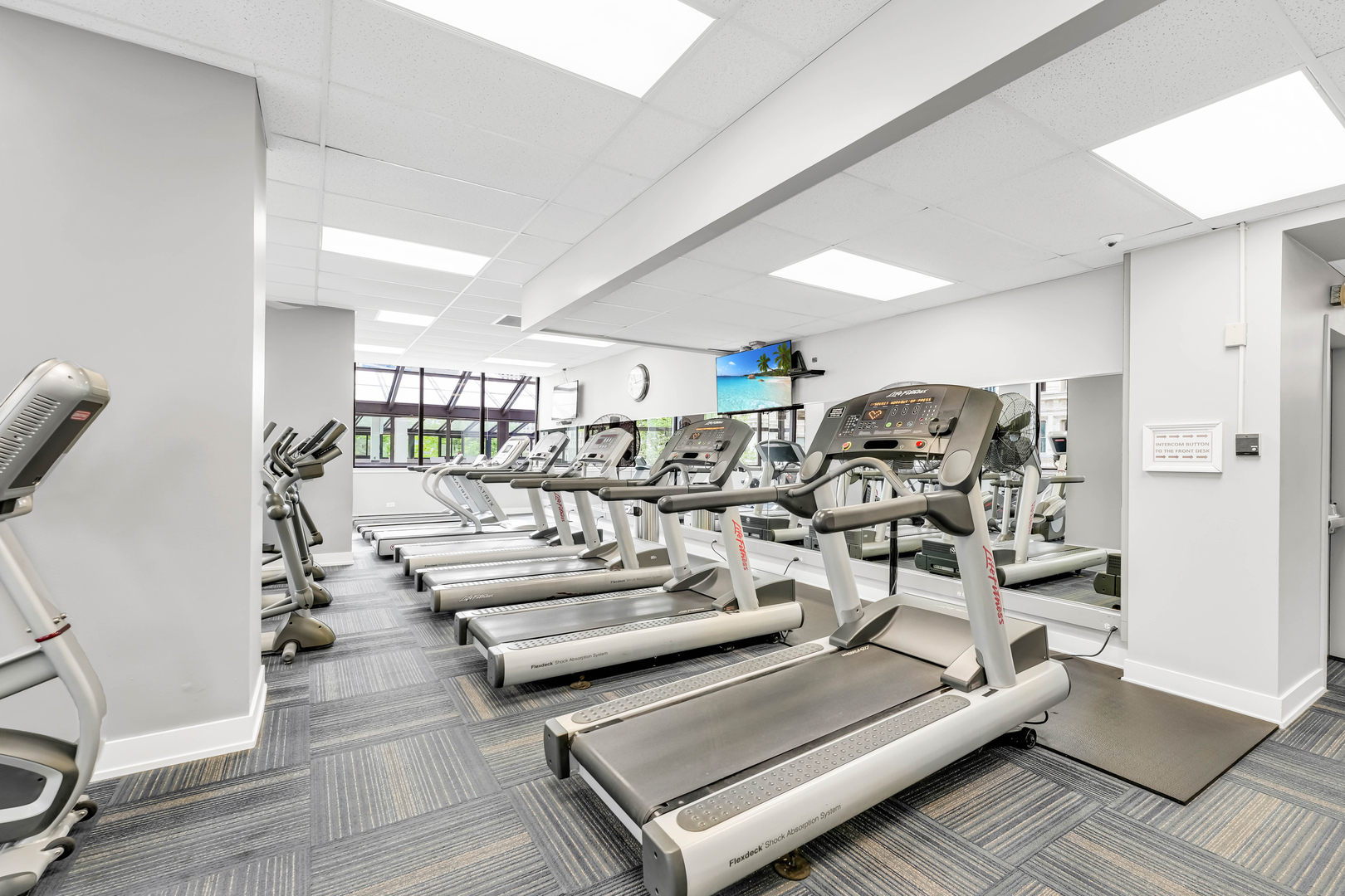405 North Wabash Avenue, Unit 4512 Chicago, IL 60611 - Photo 11 of 20 a living room with lots of furniture and white walls