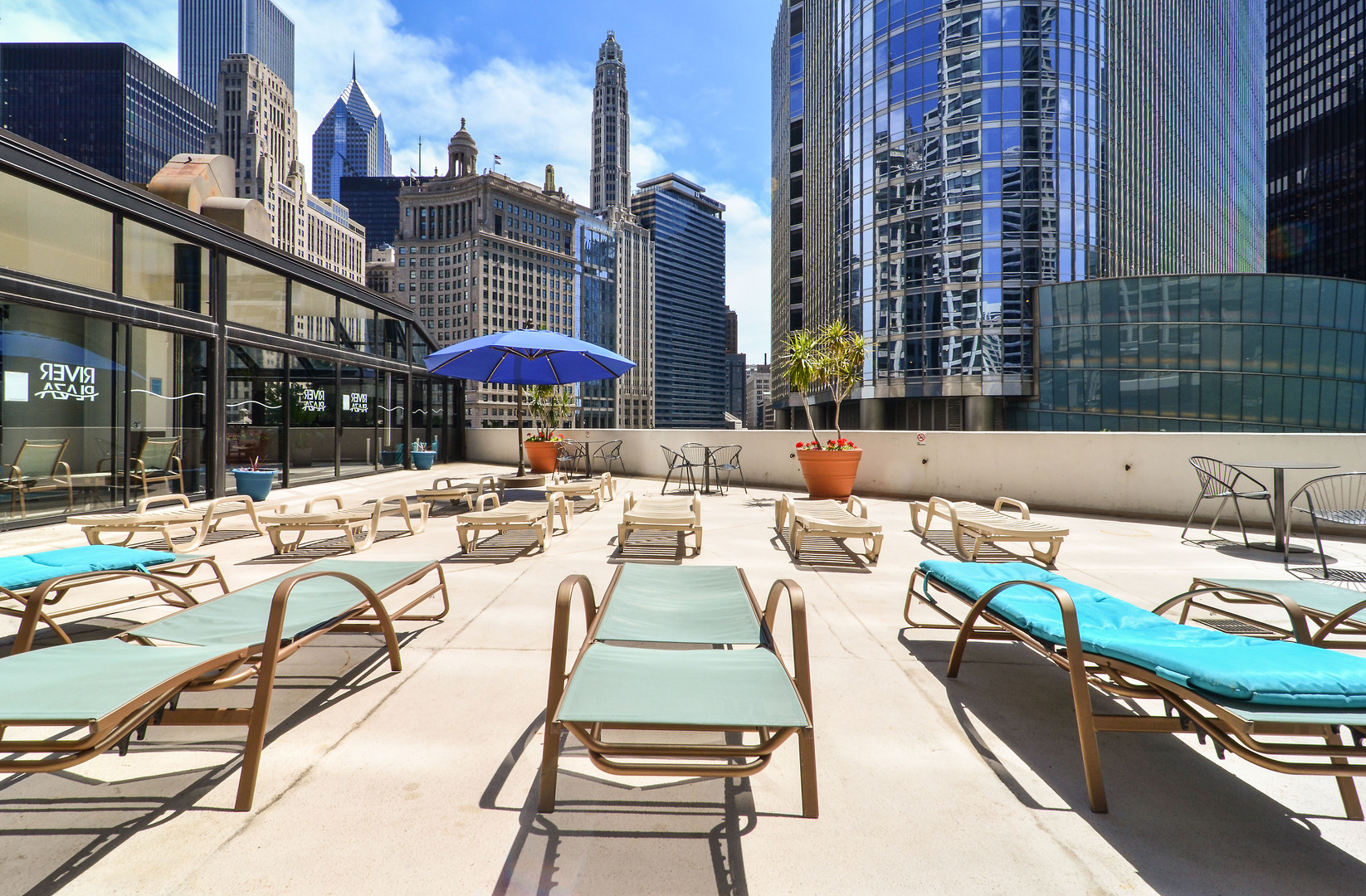 405 North Wabash Avenue, Unit 4512 Chicago, IL 60611 - Photo 19 of 20 a view of a patio with swimming pool table and chairs