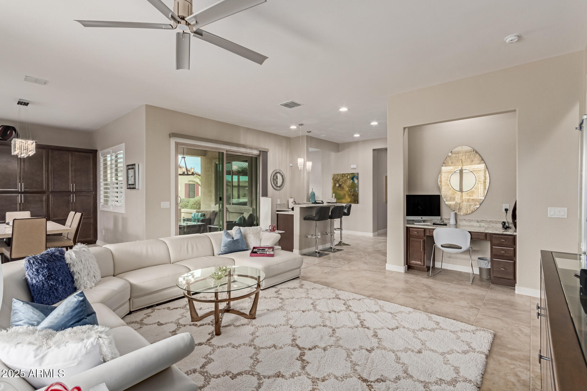 41737 West Cribbage Road Maricopa, AZ 85138 - Photo 7 of 35 a living room with furniture and a large window