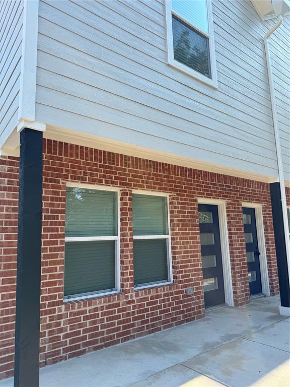 1505 Park Street, Unit A Commerce, TX 75428 - Photo 2 of 25 a front view of a house