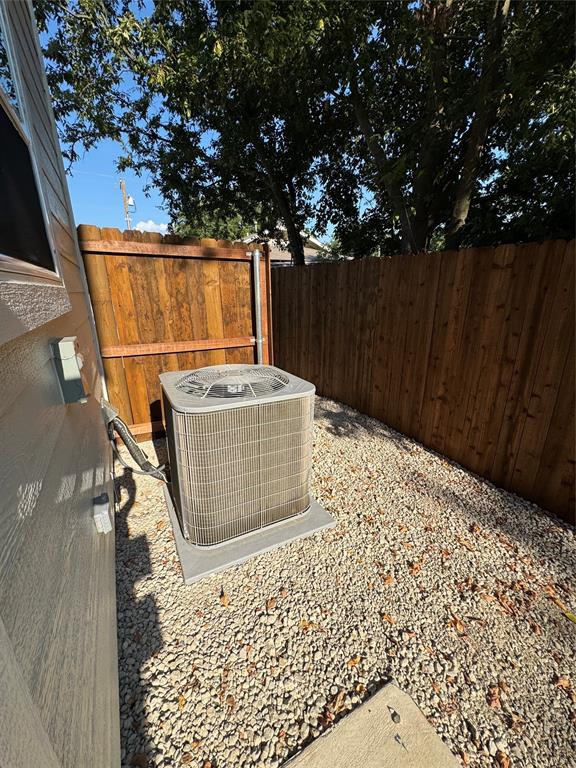1505 Park Street, Unit A Commerce, TX 75428 - Photo 24 of 25 a wooden bench sitting in front of a house