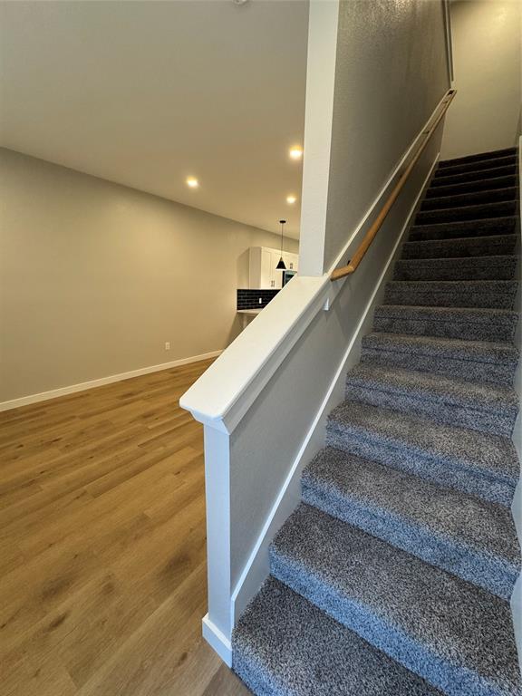 1505 Park Street, Unit A Commerce, TX 75428 - Photo 4 of 25 a view of entryway and hall with wooden floor