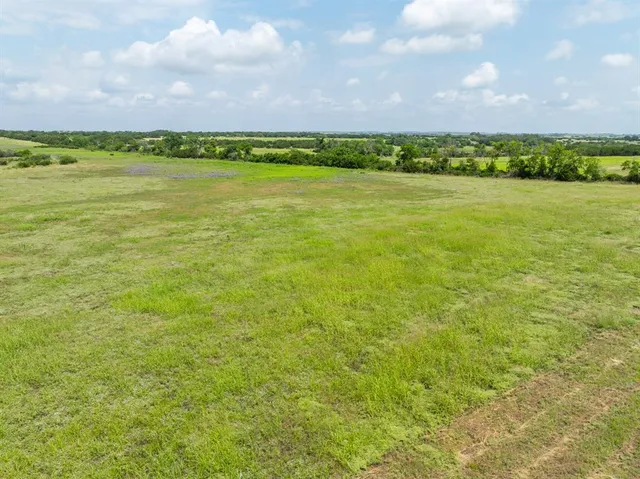 a view of a lake with a beach
