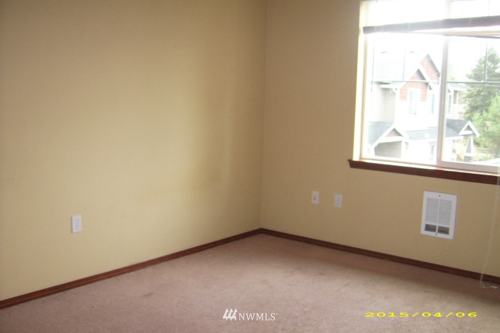 11911 East Gibson Road, Unit B Everett, WA 98204 - Photo 13 of 19 an empty room with a window
