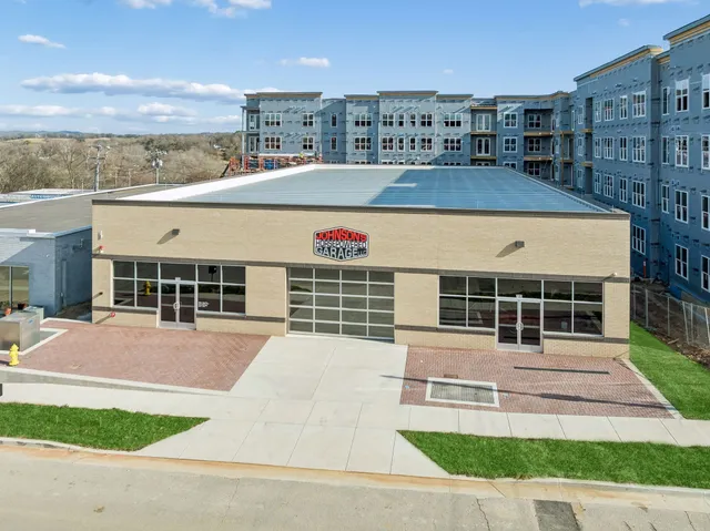 front view of a building with a yard