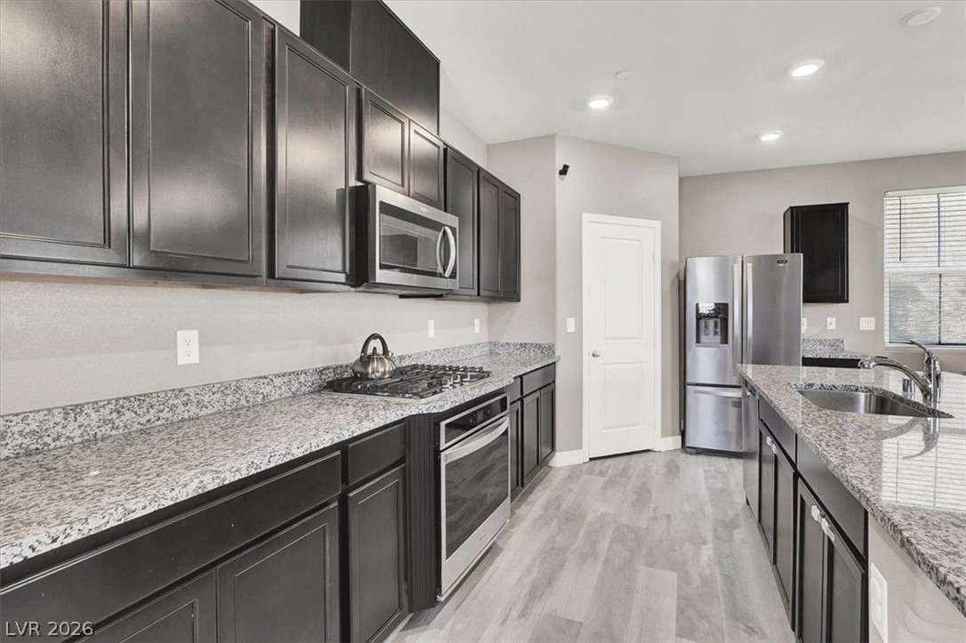 2823 Turnstone Ridge Street Henderson, NV 89044 - Photo 11 of 37 Kitchen