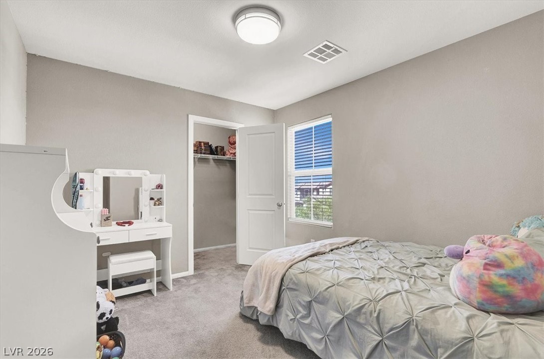 2823 Turnstone Ridge Street Henderson, NV 89044 - Photo 25 of 37 Upstairs Bedroom walk in closet
