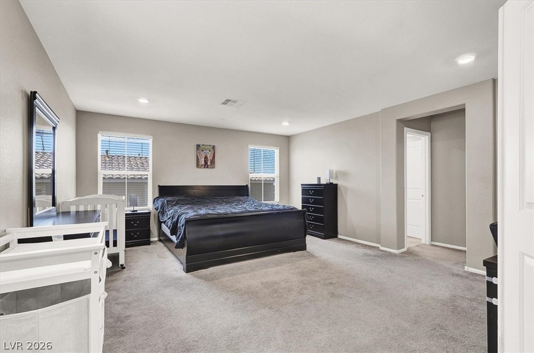 2823 Turnstone Ridge Street Henderson, NV 89044 - Photo 29 of 37 Primary Bedroom