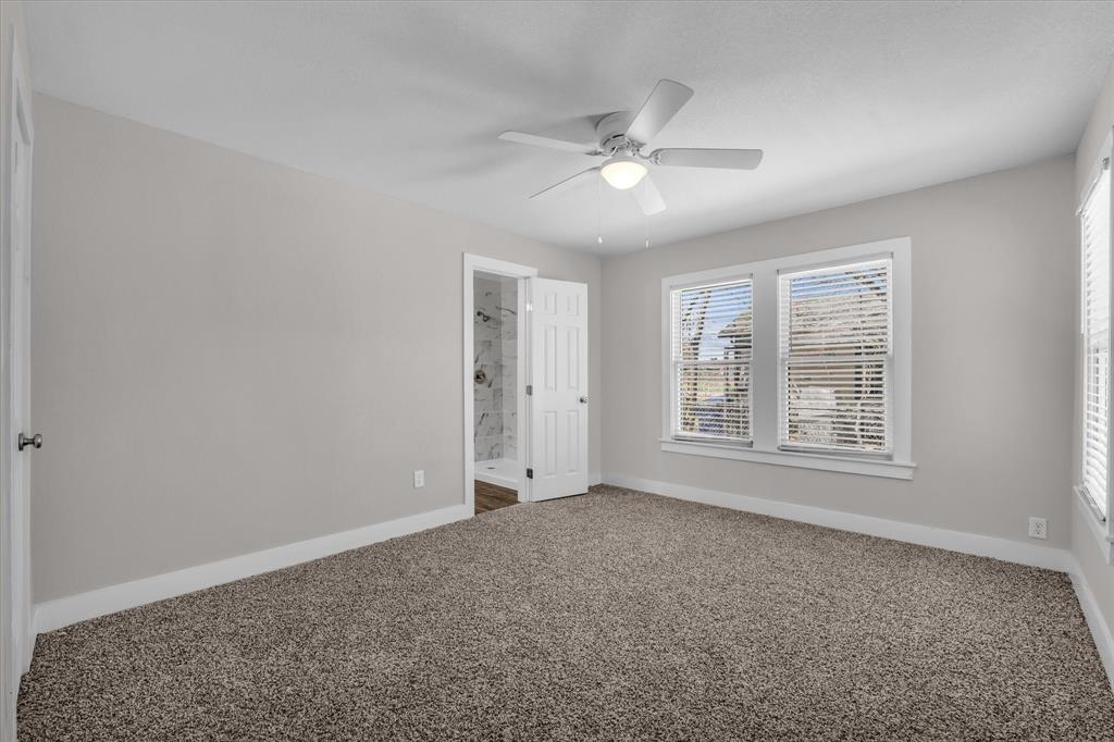 1908 South 19th Street Waco, TX 76706 - Photo 13 of 29 a view of an empty room with a window