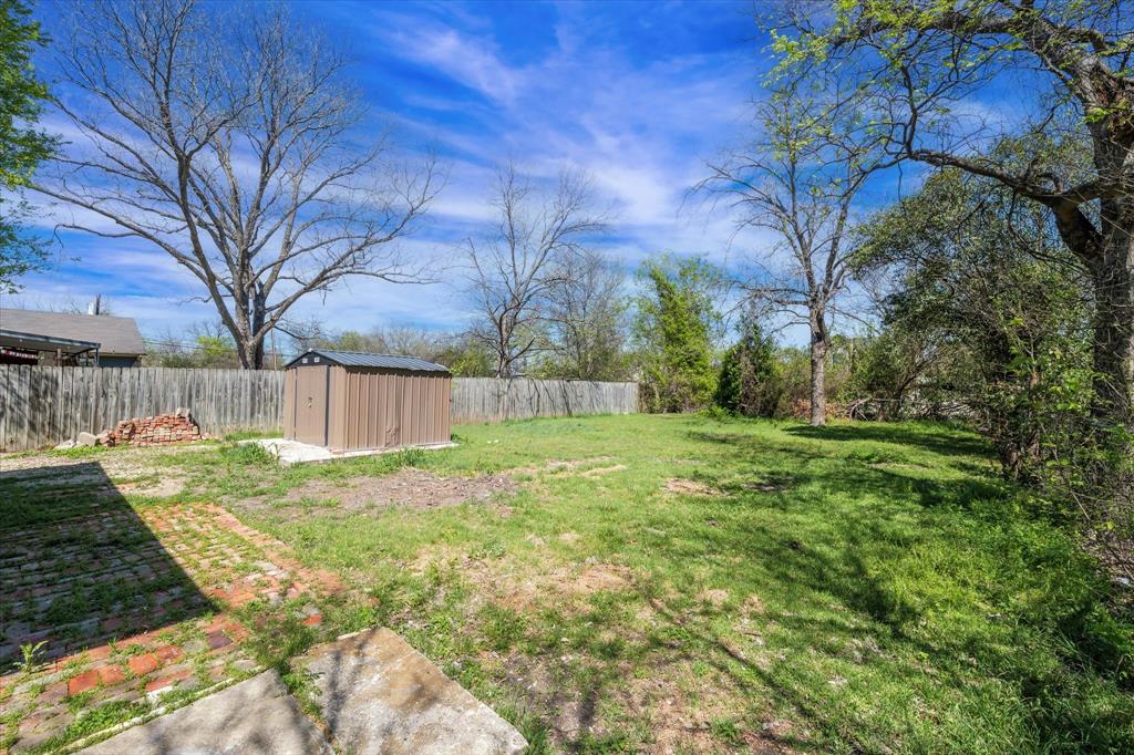 1908 South 19th Street Waco, TX 76706 - Photo 28 of 29 a view of backyard with tree