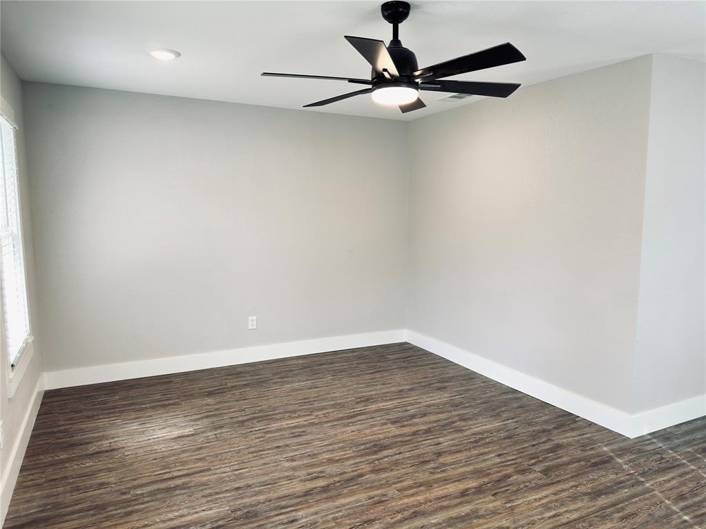 1908 South 19th Street Waco, TX 76706 - Photo 5 of 18 wooden floor in an empty room