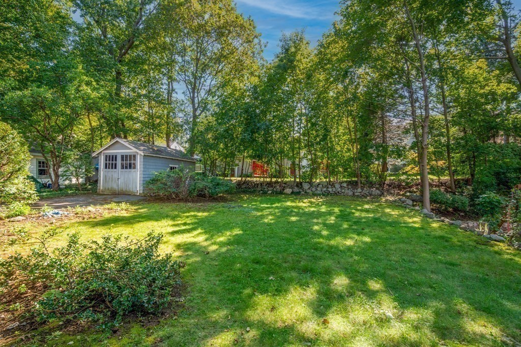 31 Ronald Road Arlington, MA 02474 - Photo 26 of 29 a front view of a house with a yard