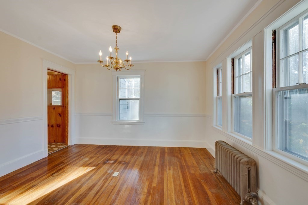 31 Ronald Road Arlington, MA 02474 - Photo 8 of 29 a view of a room with wooden floor and windows