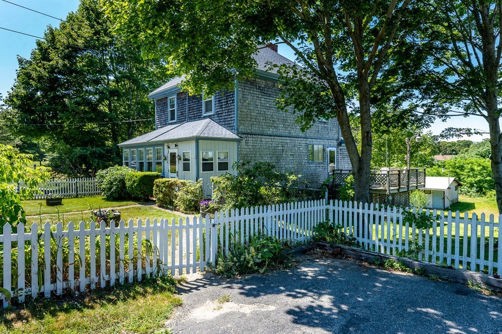 1054 County Road Bourne, MA 02534 - Photo 1 of 40 a garden view with a garden