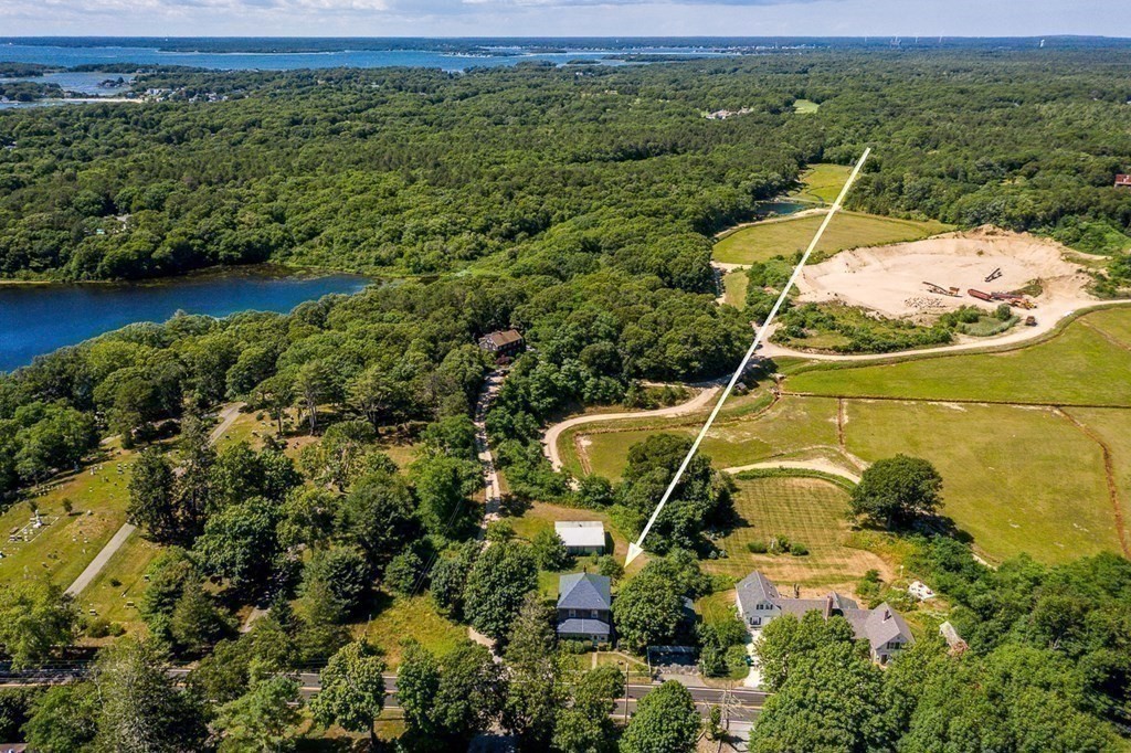 1054 County Road Bourne, MA 02534 - Photo 31 of 40 a view of a lake with a mountain