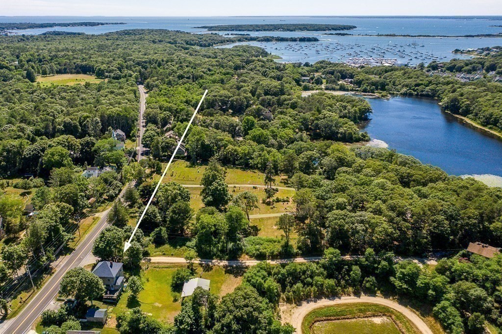 1054 County Road Bourne, MA 02534 - Photo 32 of 40 an aerial view of a houses with a yard