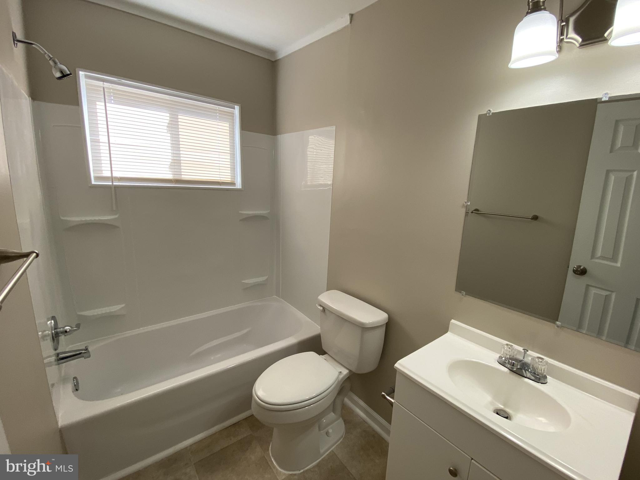 82 West Stephen Drive Newark, DE 19713 - Photo 13 of 17 a bathroom with a sink toilet and shower