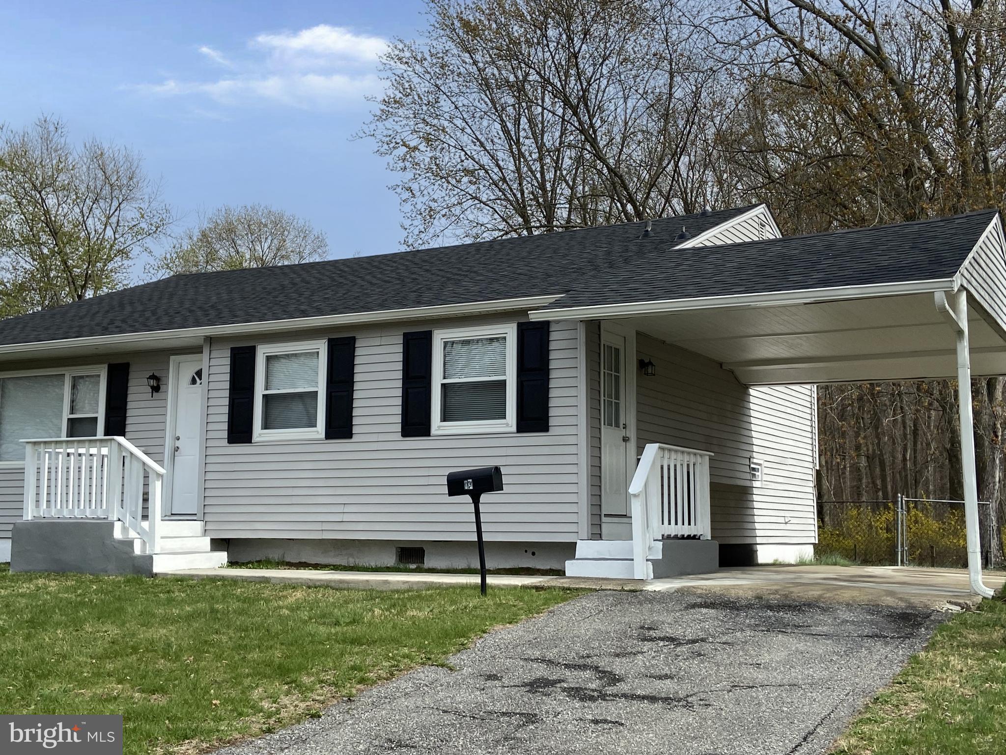 82 West Stephen Drive Newark, DE 19713 - Photo 3 of 17 a front view of a house with a yard