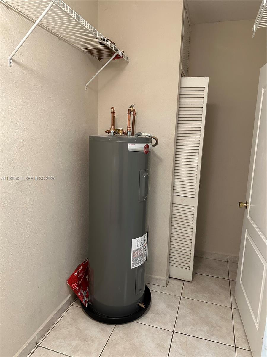 7549 Northwest 175th Street, Unit 7549 Hialeah, FL 33015 - Photo 17 of 34 a view of a storage & utility room