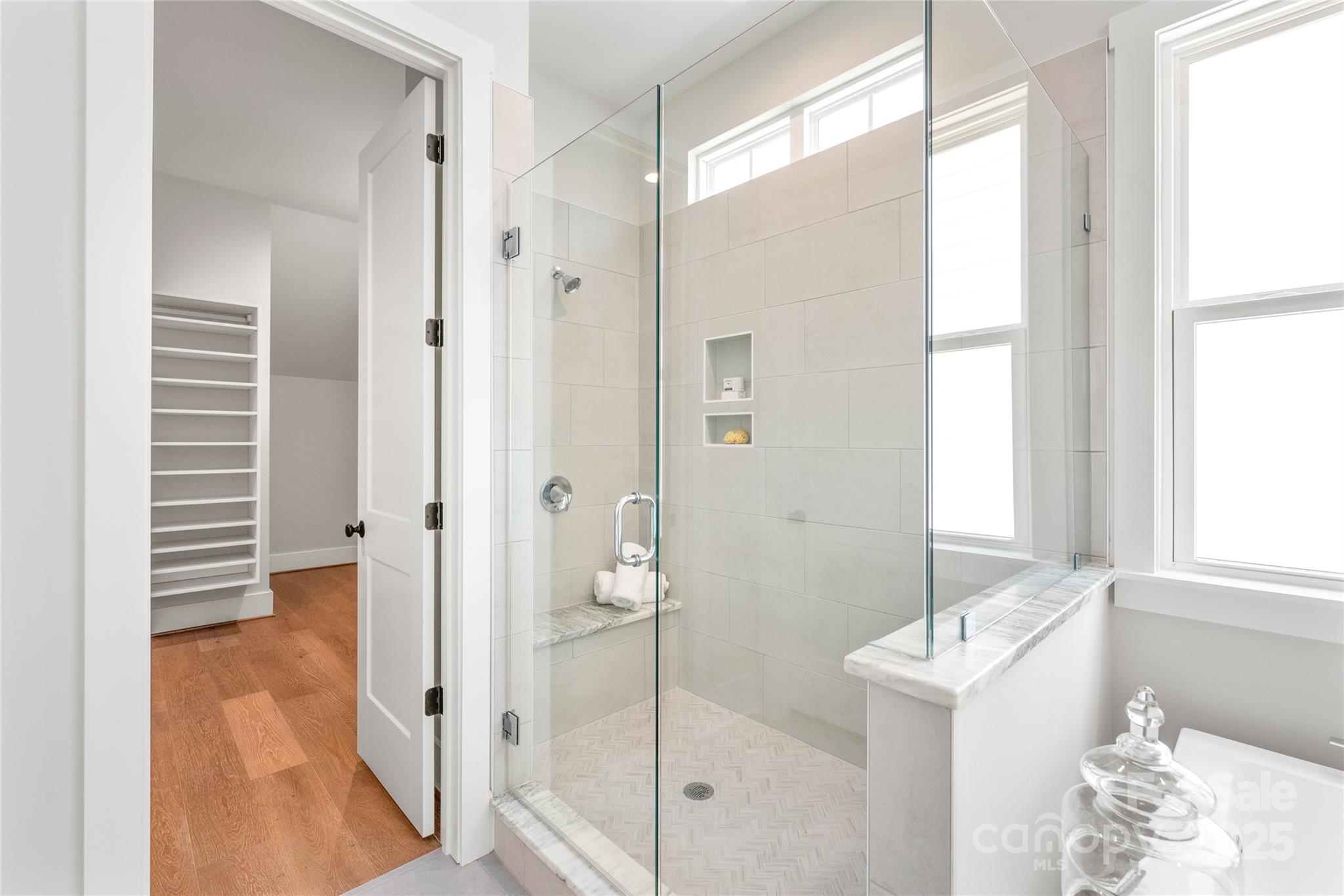 19028 Newburg Hill Road, Unit 22 Davidson, NC 28036 - Photo 21 of 44 a bathroom with a shower and a sink
