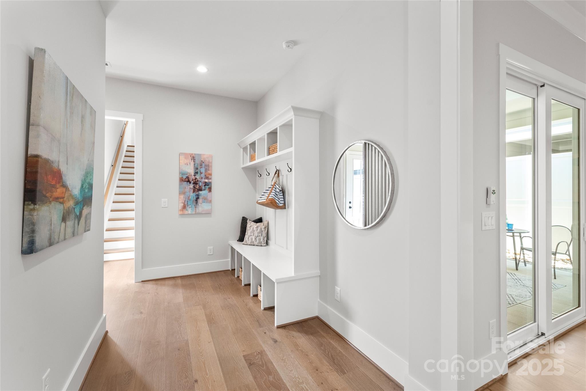 19028 Newburg Hill Road, Unit 22 Davidson, NC 28036 - Photo 24 of 44 a view of room with window and wooden floor