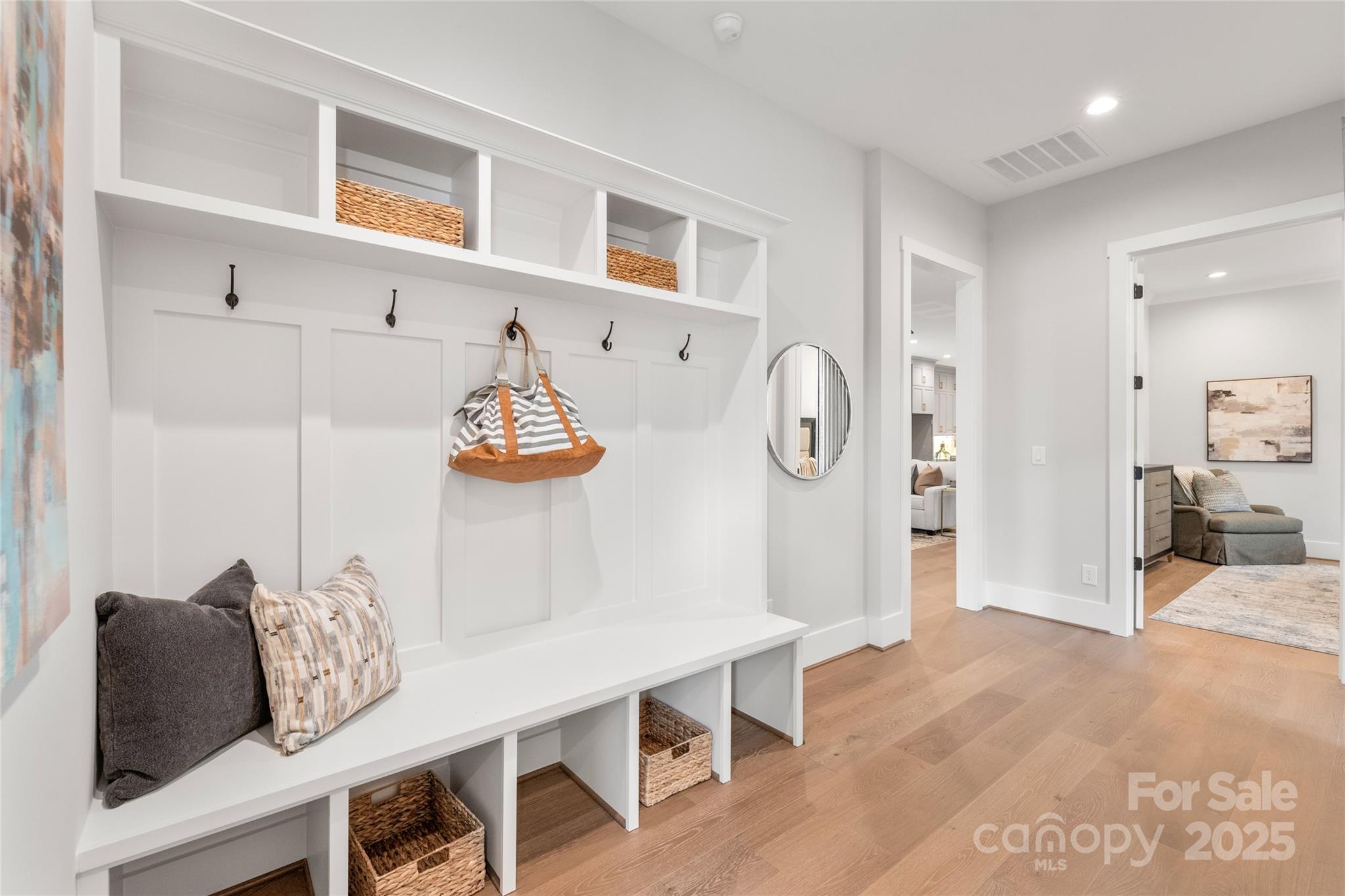 19028 Newburg Hill Road, Unit 22 Davidson, NC 28036 - Photo 25 of 44 a view of a dining room with furniture and wooden floor