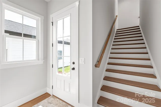 a view of an entryway with staircase