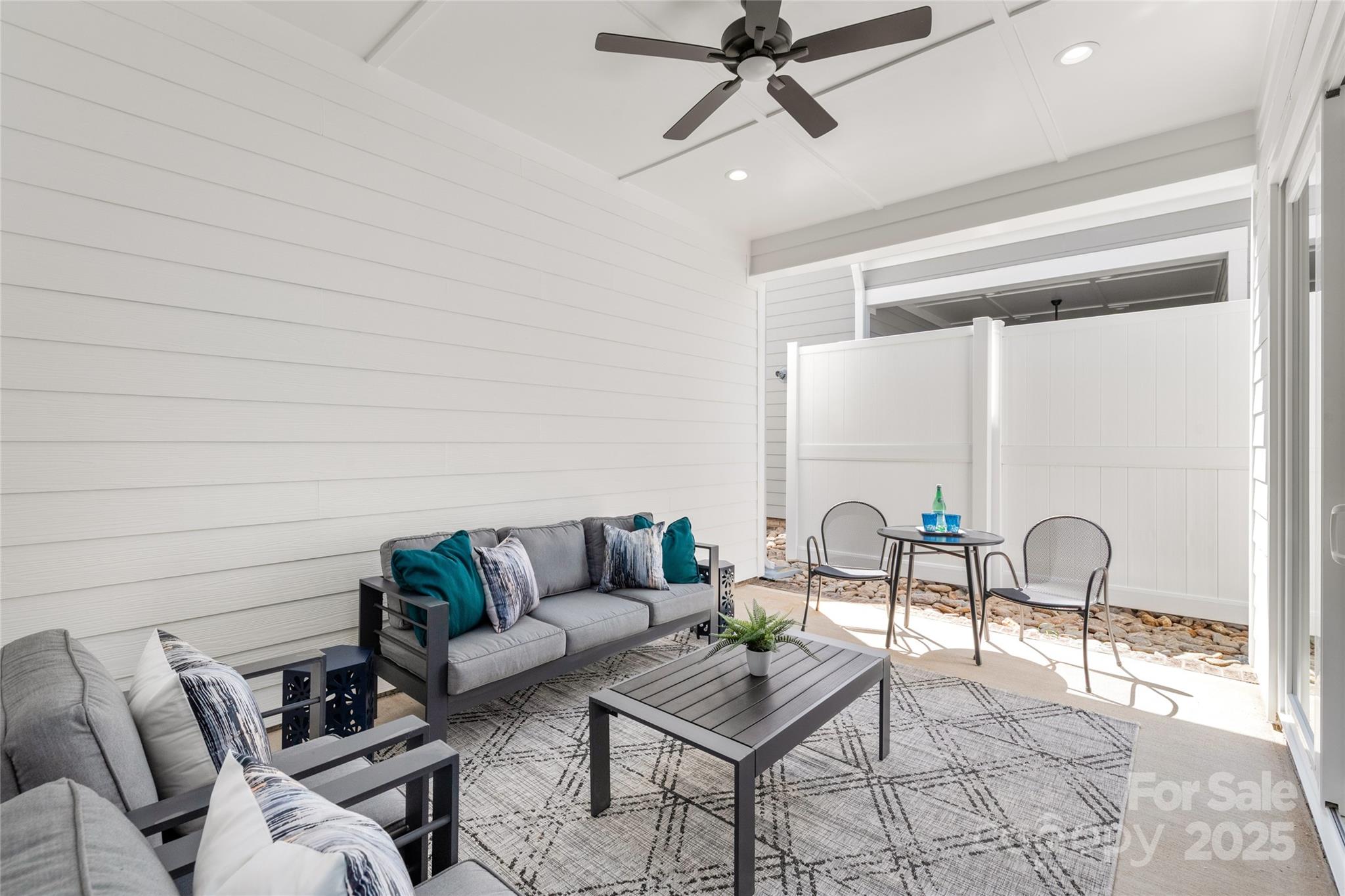 19028 Newburg Hill Road, Unit 22 Davidson, NC 28036 - Photo 41 of 44 a living room with furniture and a window