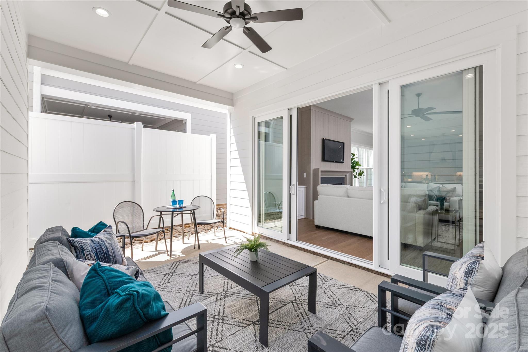 19028 Newburg Hill Road, Unit 22 Davidson, NC 28036 - Photo 42 of 44 a living room with furniture and a large window