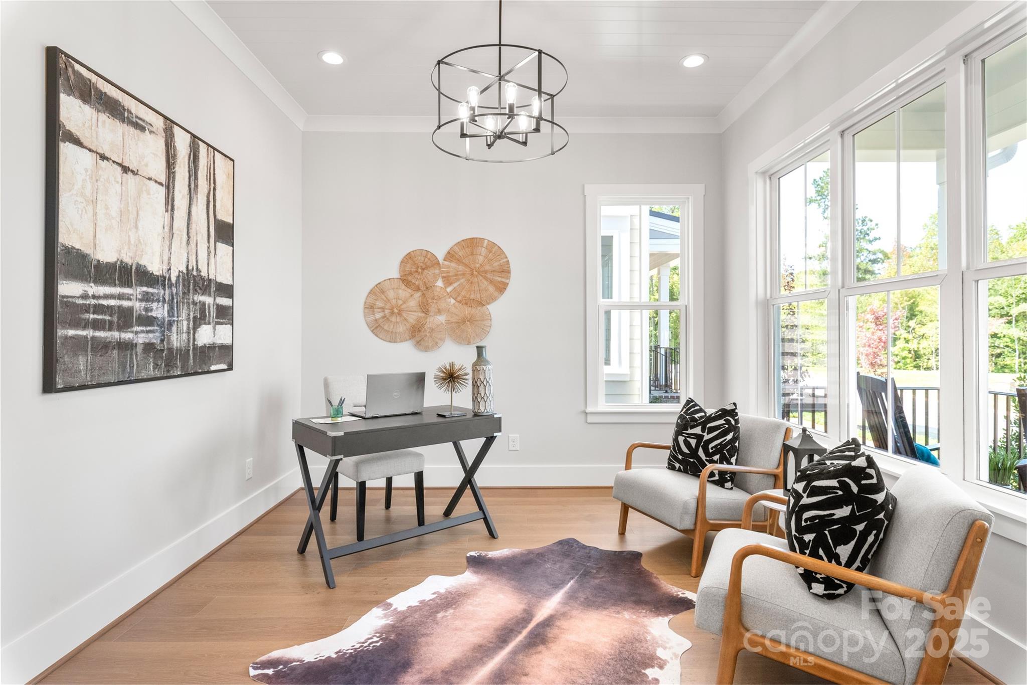 19028 Newburg Hill Road, Unit 22 Davidson, NC 28036 - Photo 8 of 44 a view of a dining room with furniture a chandelier and a window