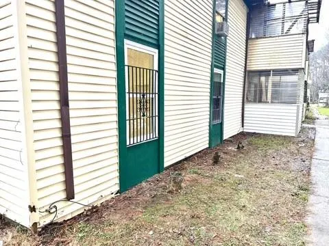a view of a bedroom with a balcony