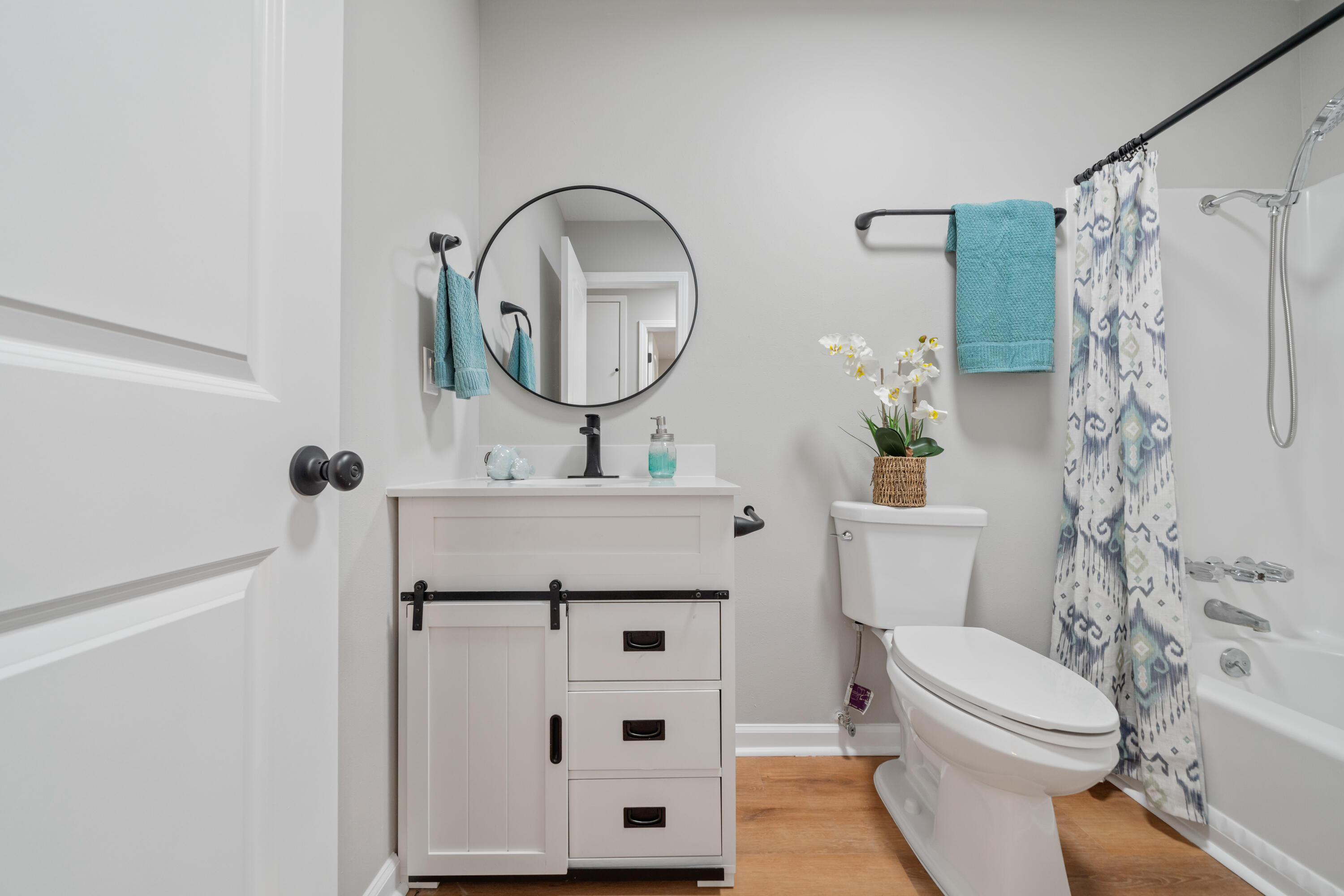37 Beech Lane DeFuniak Springs, FL 32435 - Photo 11 of 26 a bathroom with a toilet a sink and a mirror