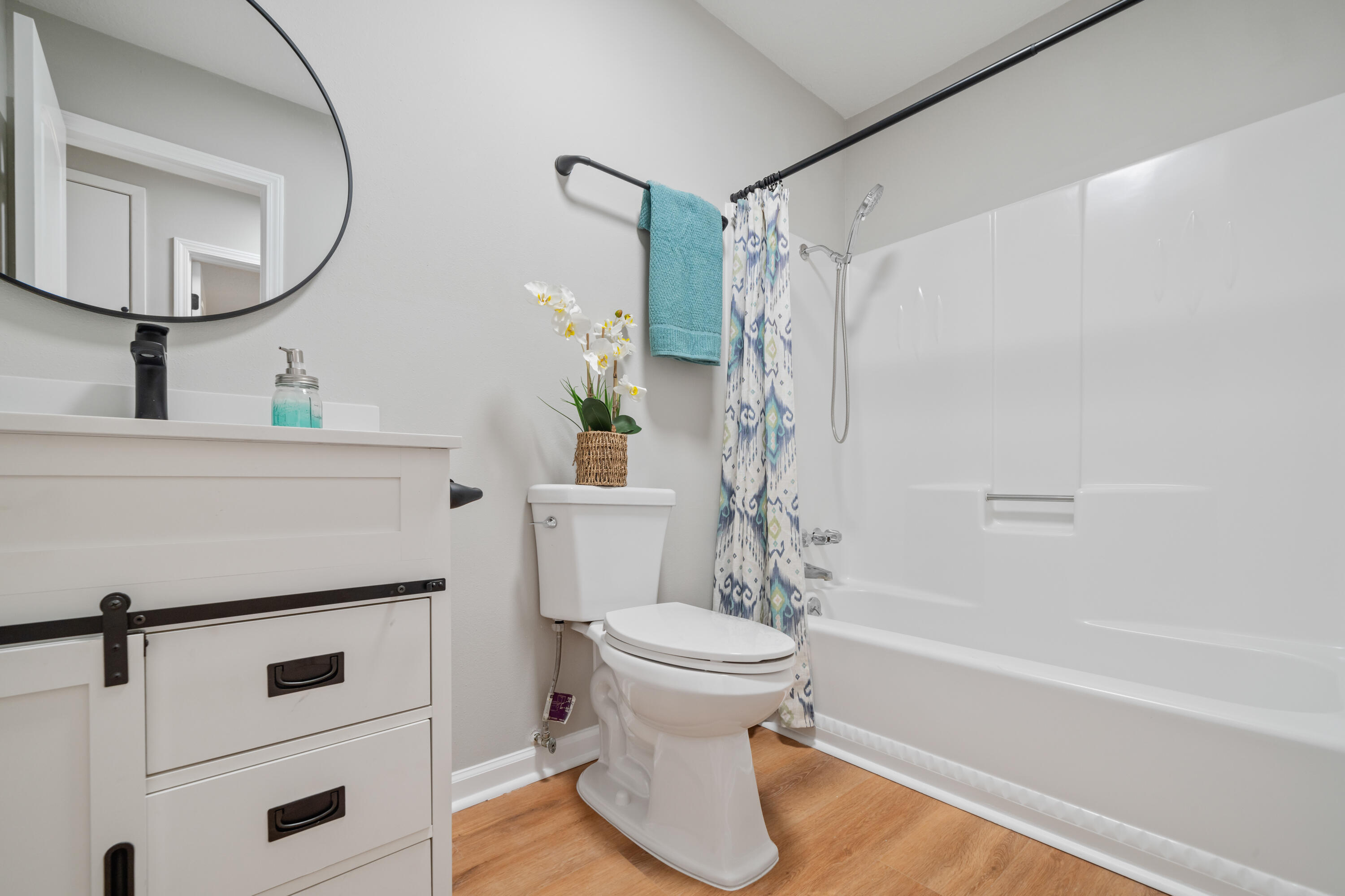 37 Beech Lane DeFuniak Springs, FL 32435 - Photo 12 of 26 a bathroom with a sink a toilet and a mirror