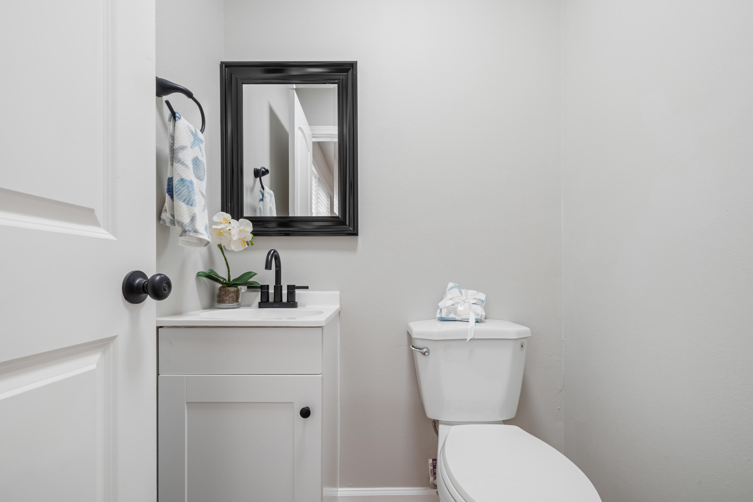 37 Beech Lane DeFuniak Springs, FL 32435 - Photo 13 of 26 a bathroom with a toilet sink and mirror