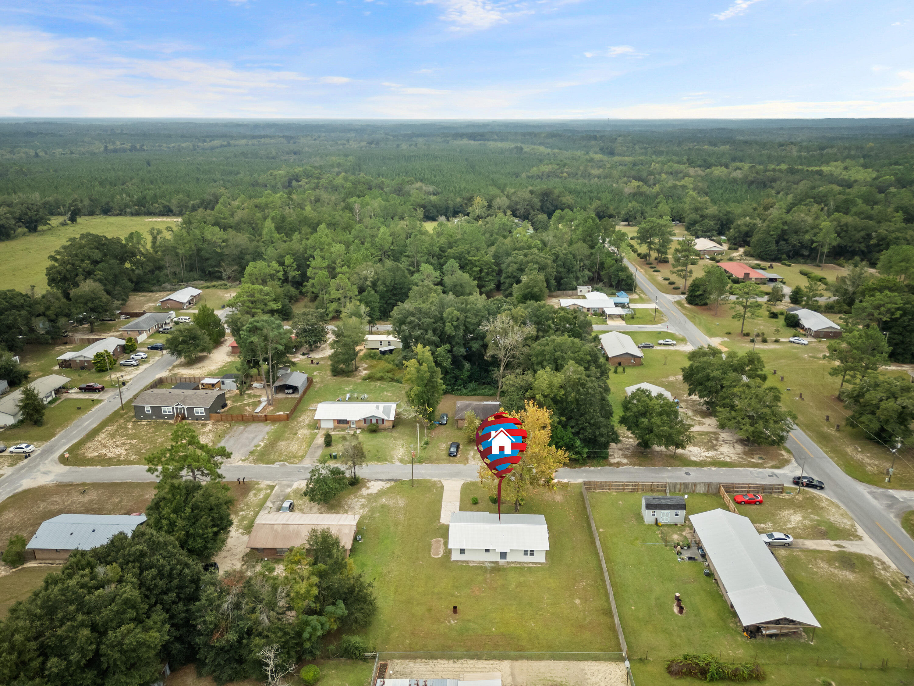 37 Beech Lane DeFuniak Springs, FL 32435 - Photo 25 of 26 an aerial view of residential houses with outdoor space
