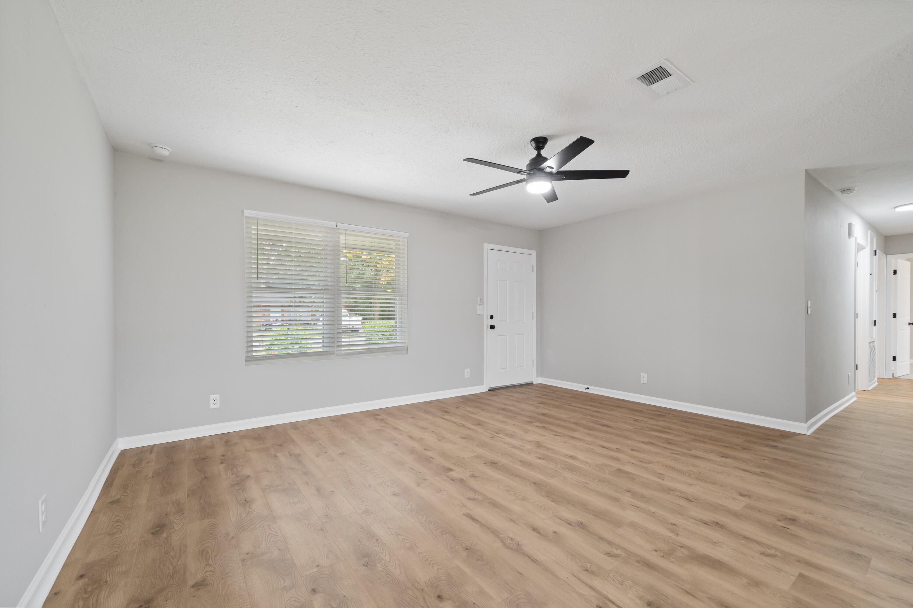 37 Beech Lane DeFuniak Springs, FL 32435 - Photo 7 of 26 a view of an empty room with a window