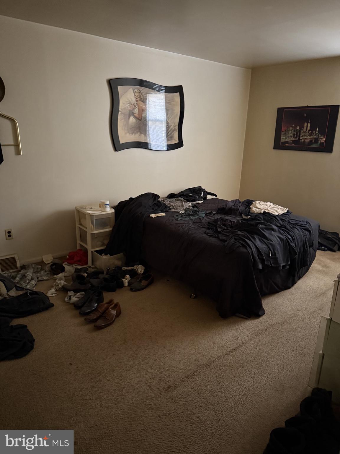 10218 Bustleton Avenue Philadelphia, PA 19116 - Photo 4 of 18 a bedroom with a bed and furniture