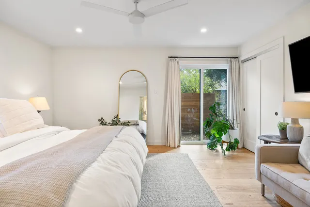 a view of yard with swimming pool and green space